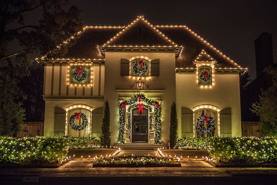 Golden Glow Christmas light installation on a Fresno home