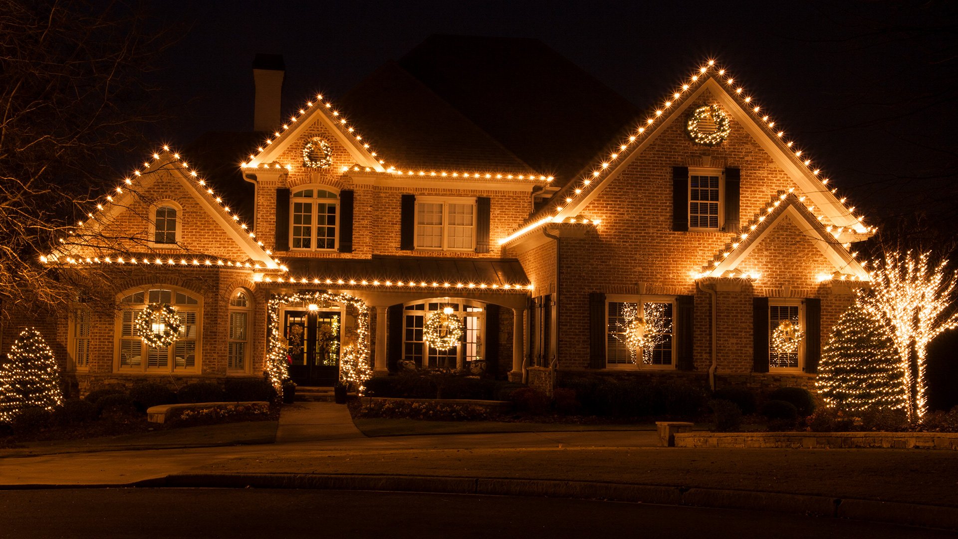Before and after Christmas light installation on a home